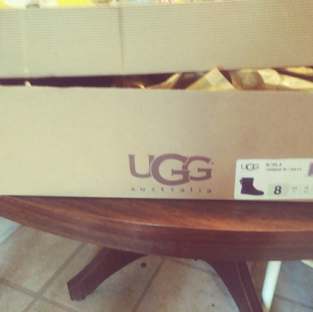 Uggs- Size 8. Dark Navy. Still in box. Never worn.